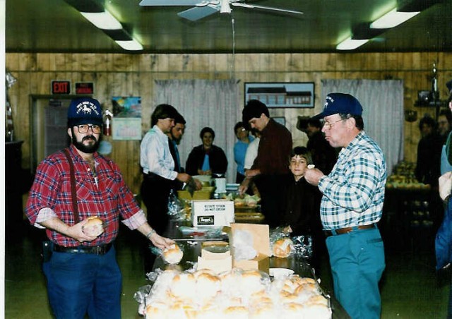 John E. Sheaffer Jr. makes the sandwiches, and Mark Beyer eating the profits; Ambulance ham and cheese sandwich sale... 2/15/92